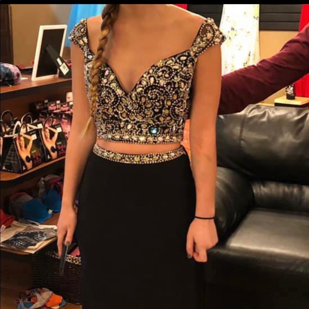 Simple yes stunning black 2 piece prom dress. New never worn, size 2 fits size 4